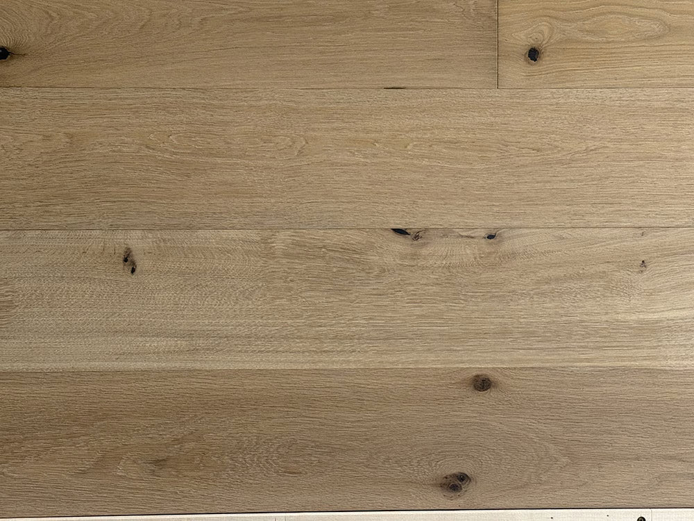 Close-up of a wooden floor with a natural finish