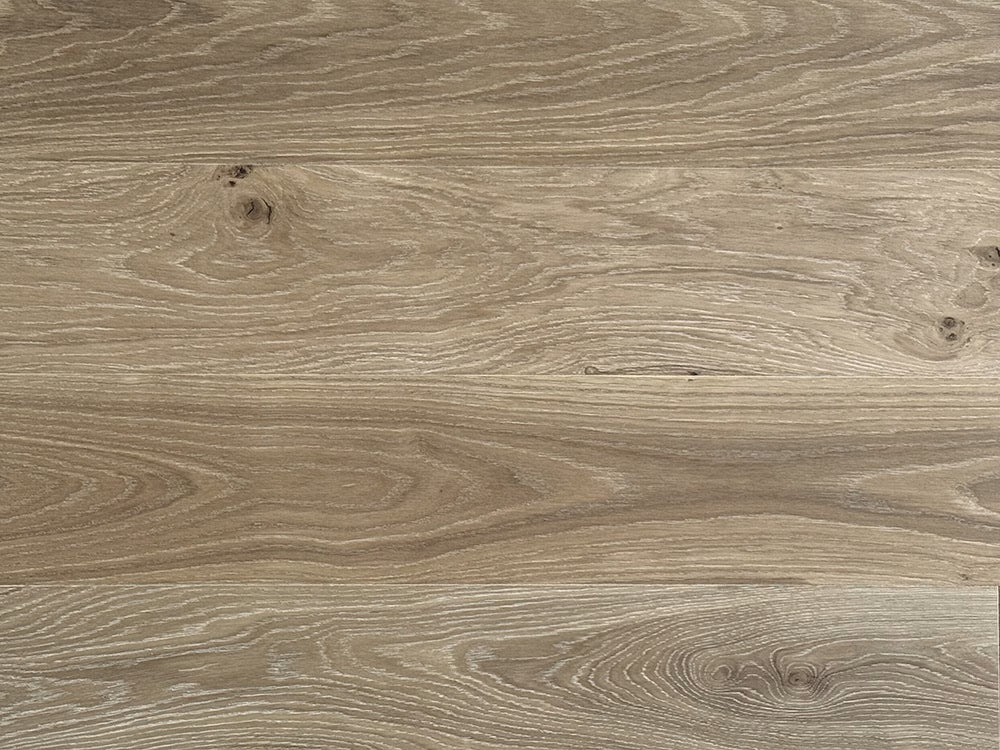 Close-up of a wood-patterned surface with visible grain and texture.