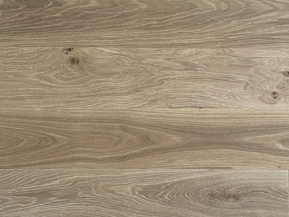Close-up of a wood-patterned surface with visible grain and texture.