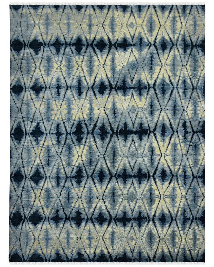 Rug with blue and beige geometric pattern on a white background