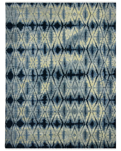Rug with blue and beige geometric pattern on a white background
