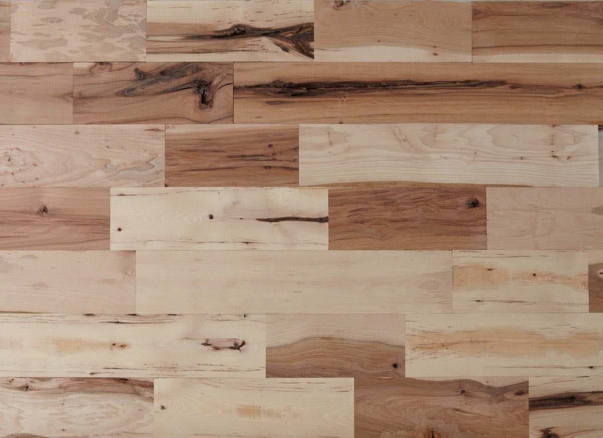 Wooden panel with a patchwork of different wood types