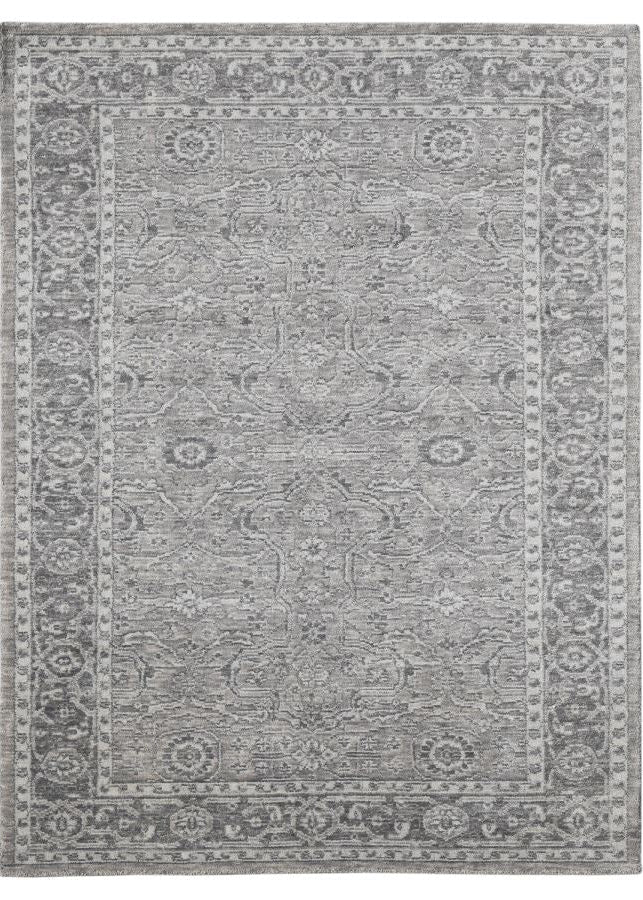 Gray patterned rug on a white background