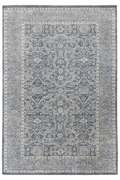 Decorative rug with intricate pattern on a white background