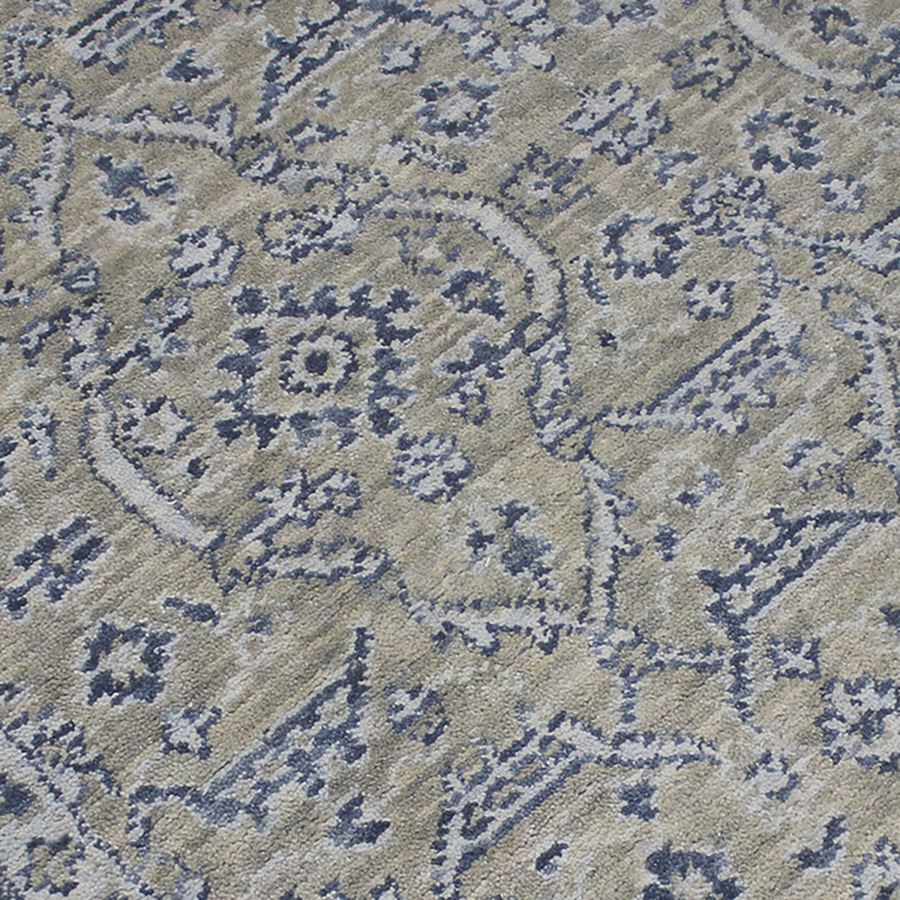 Close-up of a patterned fabric with blue and beige colors
