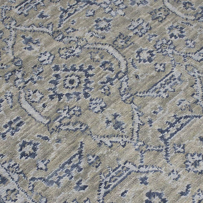 Close-up of a patterned fabric with blue and beige colors