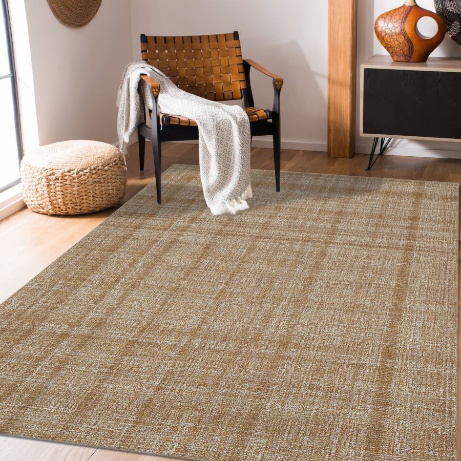 Living room with a checkered brown rug, woven chair, and decorative items.