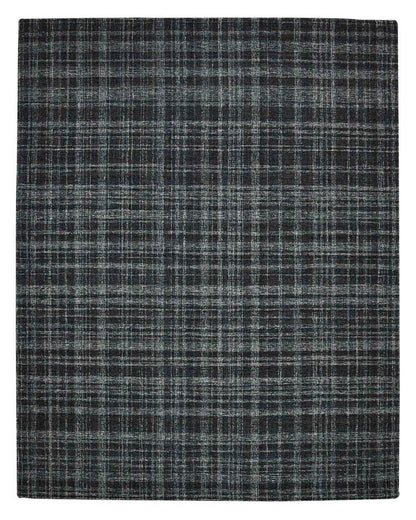 Plaid patterned rug with dark and light gray colors on a white background