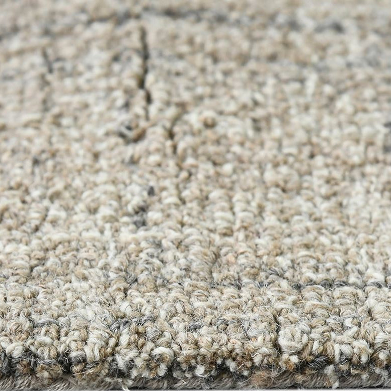 Close-up of a textured beige carpet