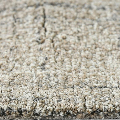 Close-up of a textured beige carpet