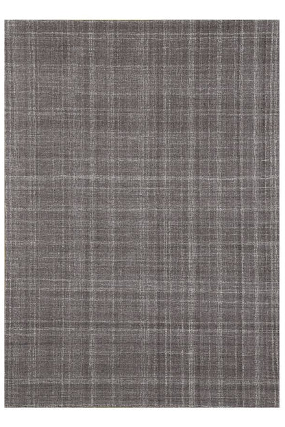 Textured gray rug on a white background