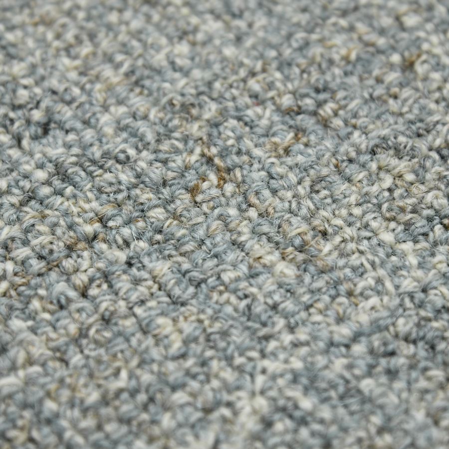 Close-up of textured gray carpet