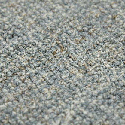 Close-up of textured gray carpet