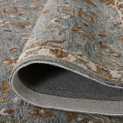 Close-up of a patterned rug with a focus on the texture and design.