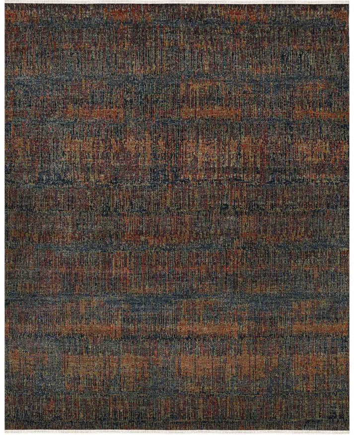 Textured area rug with a pattern of dark and brown colors on a white background