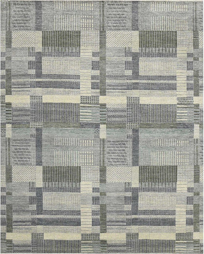 Patterned rug with geometric design on a white background