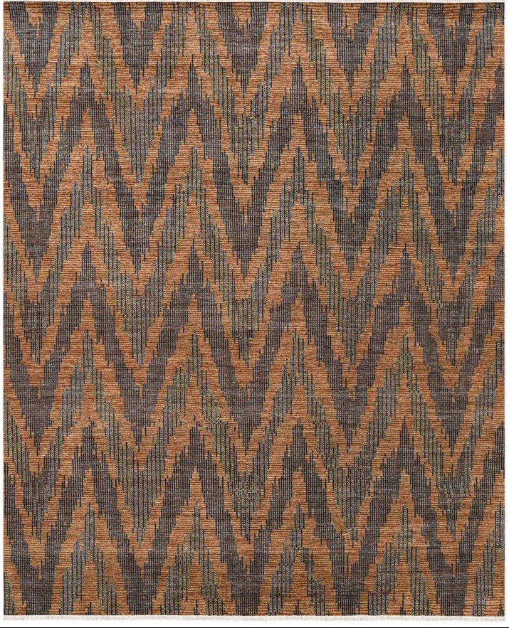 Rug with brown and black zigzag pattern on a white background