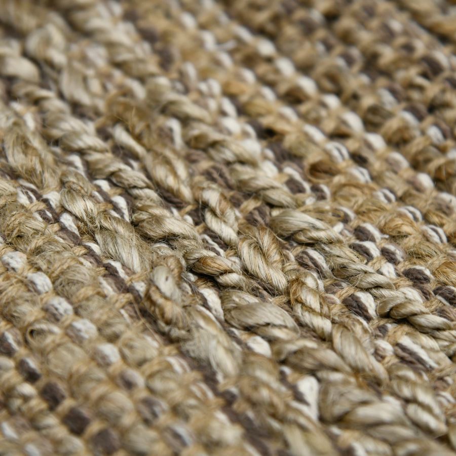 Close-up of a textured woven material with earthy tones