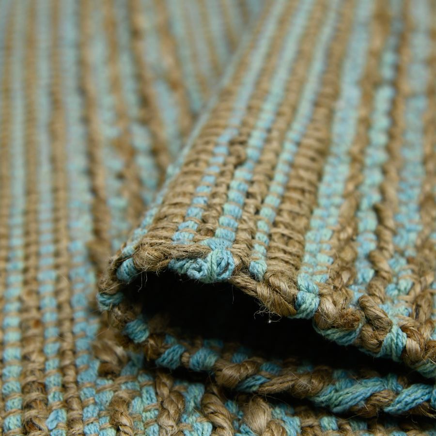 Close-up of a textured fabric with brown and blue stripes
