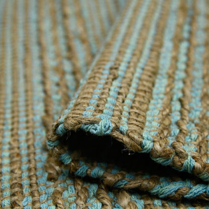Close-up of a textured fabric with brown and blue stripes