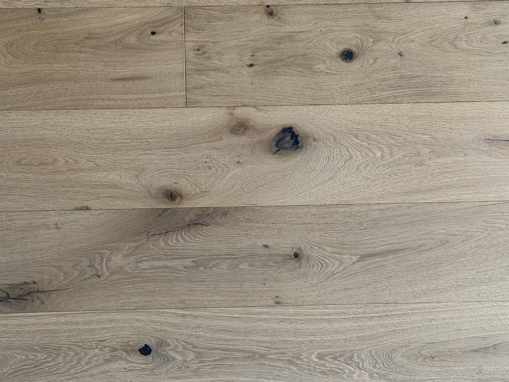 Close-up of wooden flooring with a natural finish