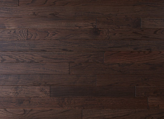 Dark brown wooden flooring with visible grain and texture