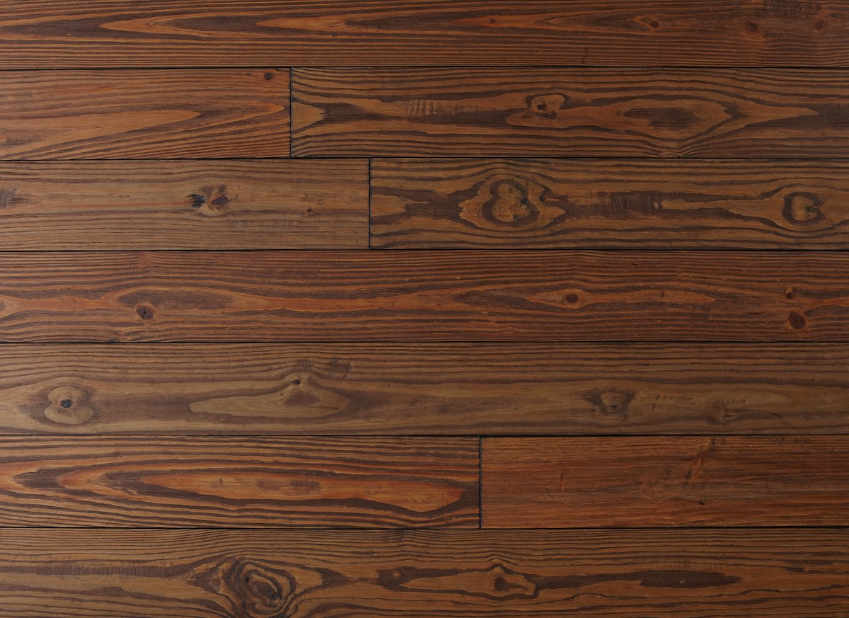 Close-up of a wooden floor with visible grain and texture
