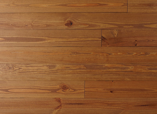 Close-up of a wooden floor with visible grain and texture