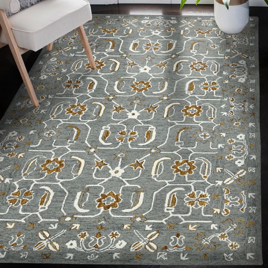 Decorative rug with floral pattern on a dark floor