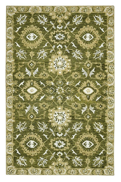 Decorative green rug with intricate patterns on a white background