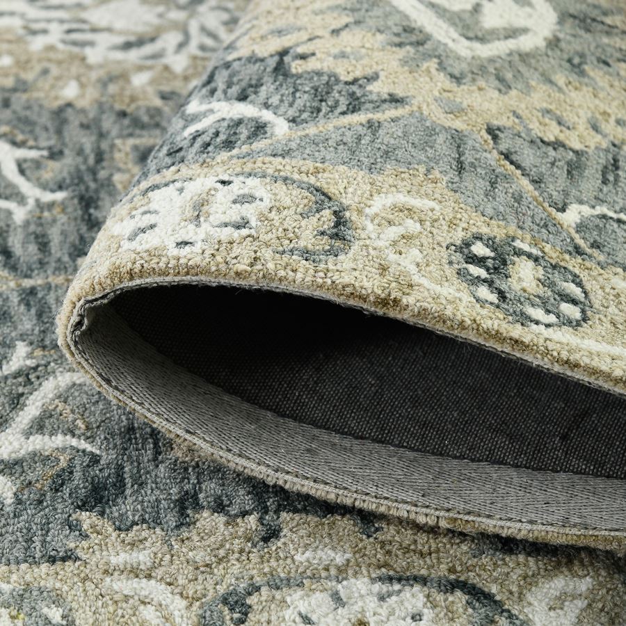 Close-up of a patterned rug with a focus on the texture and design.