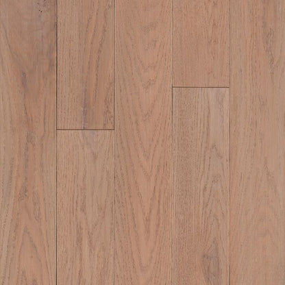 Close-up of a wooden floor with a warm brown color.