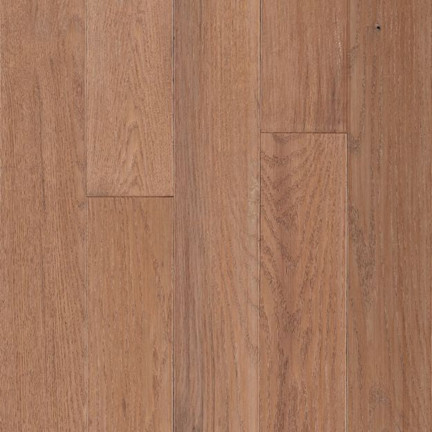 Close-up of a wooden floor with a warm brown color.