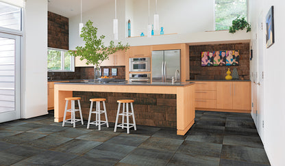 Modern kitchen with wooden island, stainless steel appliances, and decorative elements.