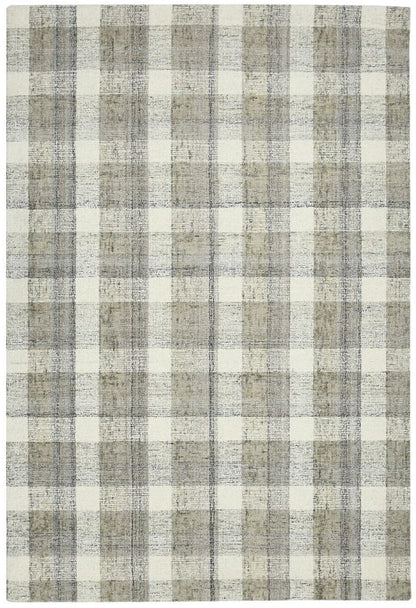 Plaid patterned rug with shades of gray and white on a white background