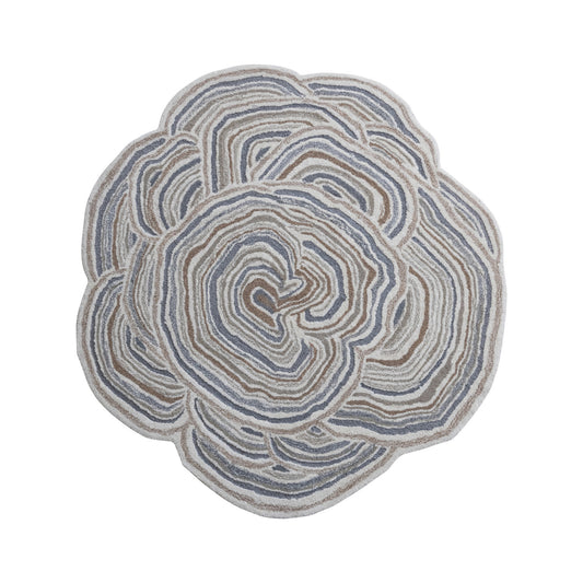 Round rug with a floral pattern on a white background