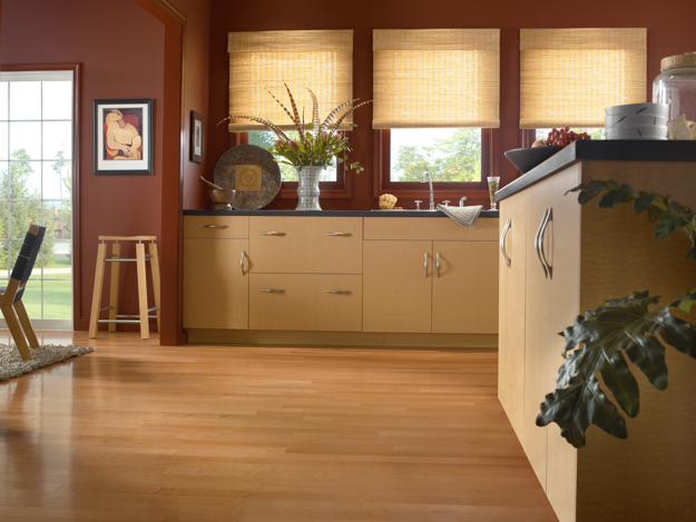 Modern kitchen with wooden cabinets and a countertop.