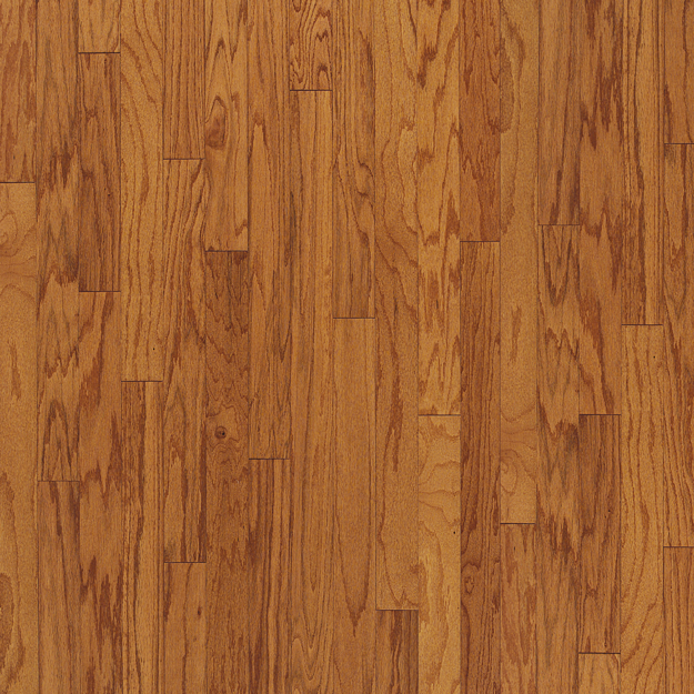 Close-up of a wooden floor with a warm brown color.