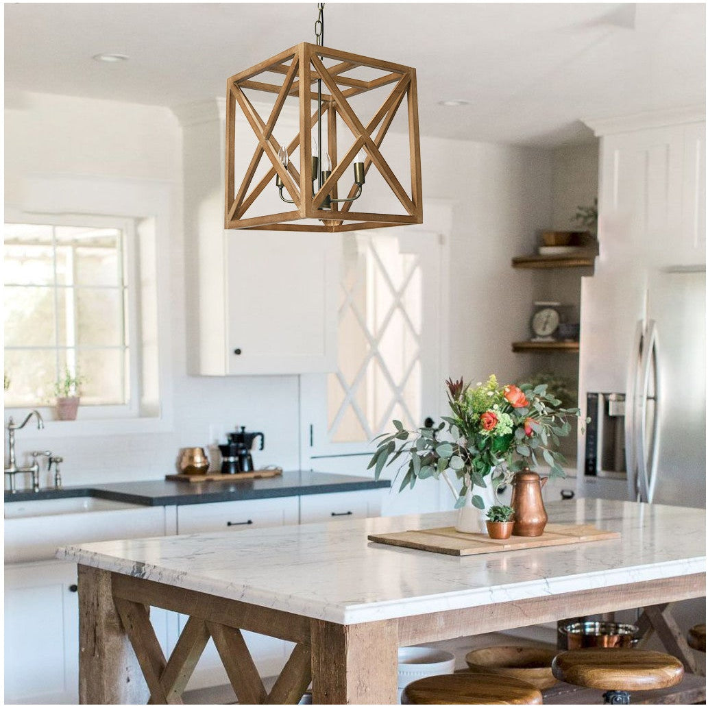 Modern kitchen with wooden pendant light, marble island, and stainless steel appliances.