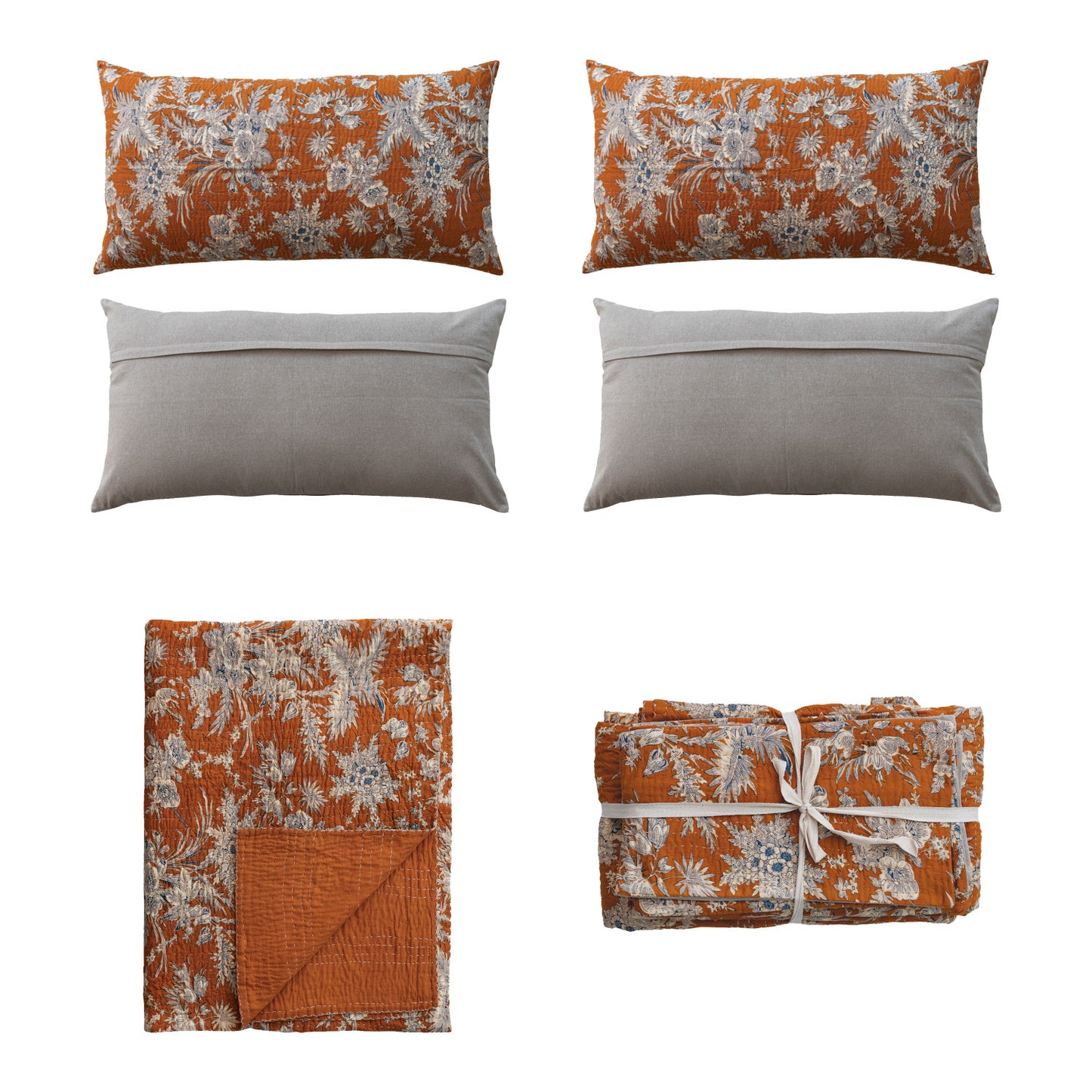 Set of floral-patterned pillows and blankets on a white background