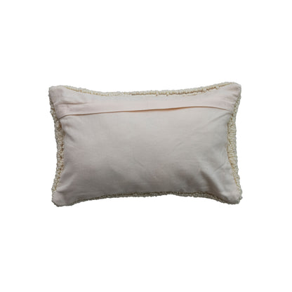 Beige pillow with decorative trim on a white background