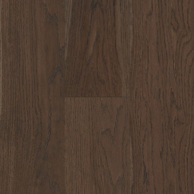 Close-up of dark brown wood flooring with visible grain and texture.