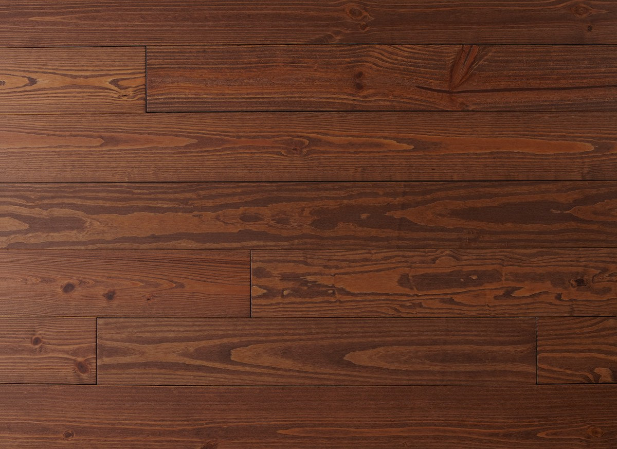 Close-up of a wooden floor with a rich brown finish