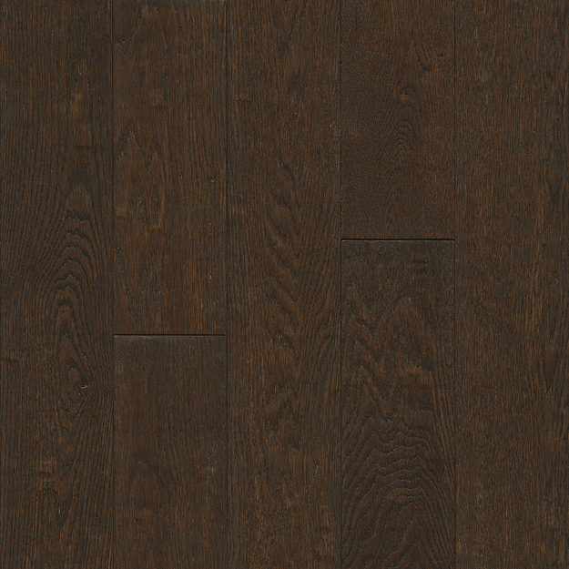Close-up of dark brown wood flooring with visible grain and texture.