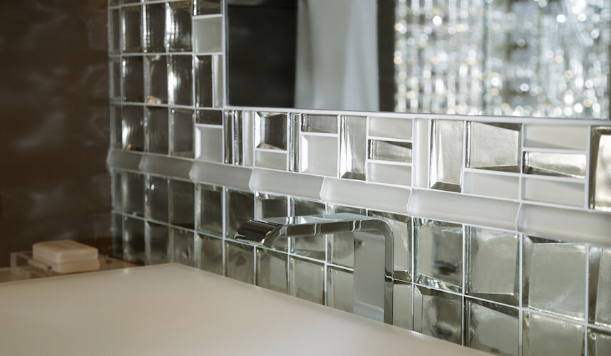 Glass mosaic tile backsplash with a modern design