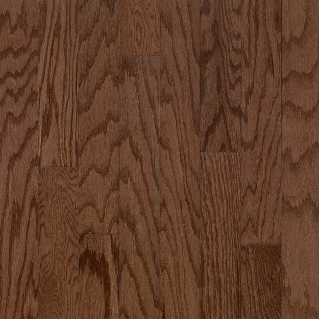 Close-up of wooden flooring with a rich brown color and visible grain pattern.