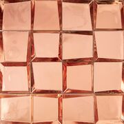 Rose gold metallic square tiles arranged in a grid pattern