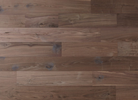 Close-up of a wooden floor with visible grain and texture